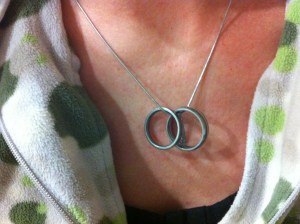 mys husbands wedding rings on a chain around my neck